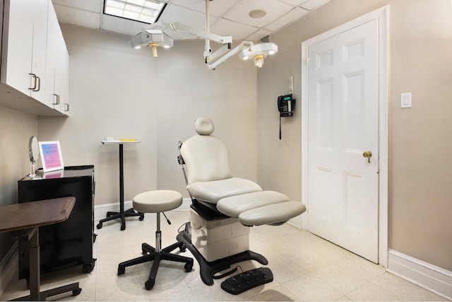 895 Park Ave Unit 1B, New York City, NY 10075 - office space featuring light floors, a paneled ceiling, and baseboards