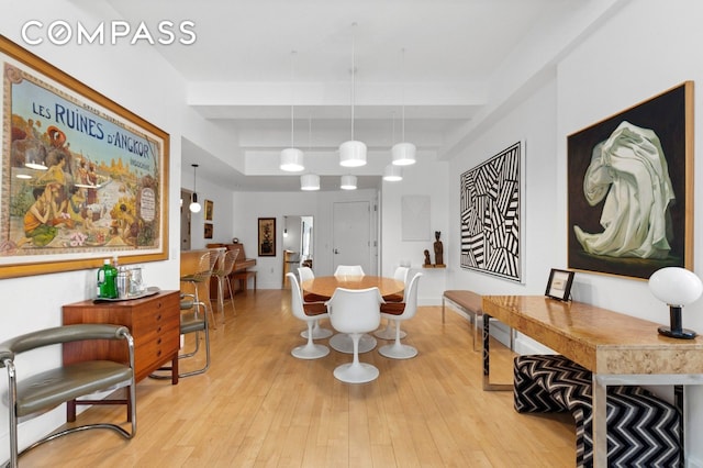 dining area with light wood-style floors