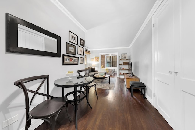 9201 Shore Rd Unit C201, New York City, NY 11209 - dining area featuring crown molding, wood finished floors, and baseboards