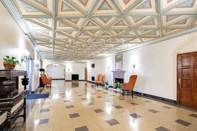 common area featuring an ornate ceiling and crown molding