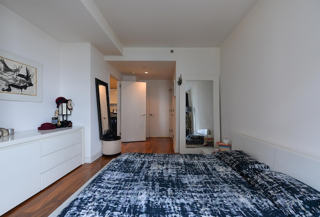 bedroom featuring wood finished floors