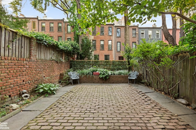 view of patio featuring a fenced backyard