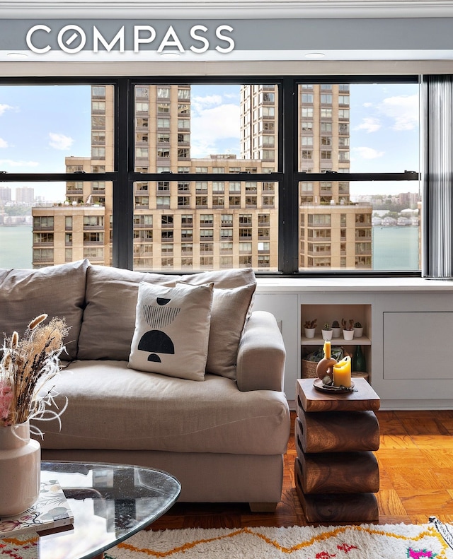 living area featuring a view of city and healthy amount of natural light