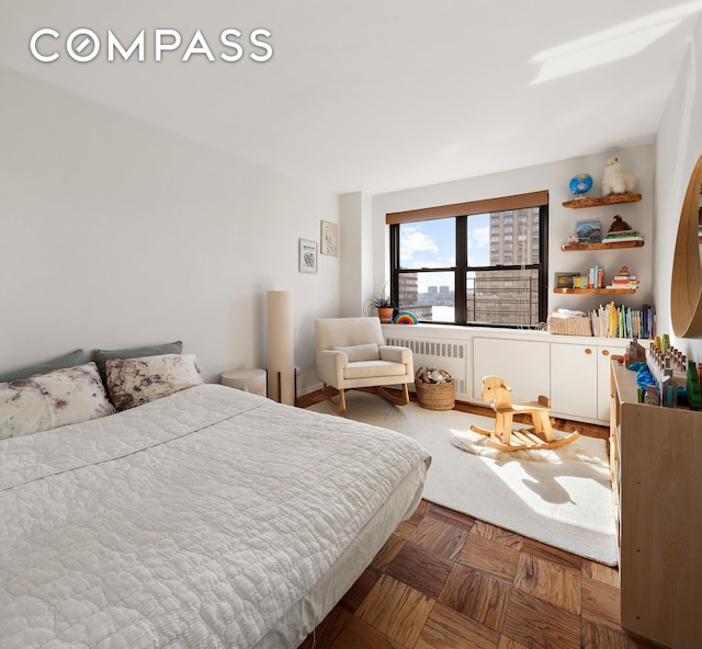 bedroom featuring radiator heating unit