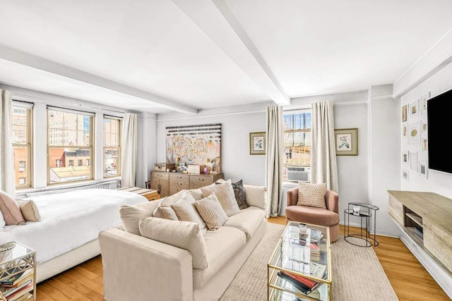 299 W 12th St Unit 7Gh, New York City, NY 10014 - living area with beamed ceiling and light wood-type flooring