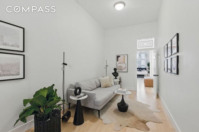 152 N 9th St Unit 1R, New York City, NY 11249 - living area with light wood-style flooring and baseboards