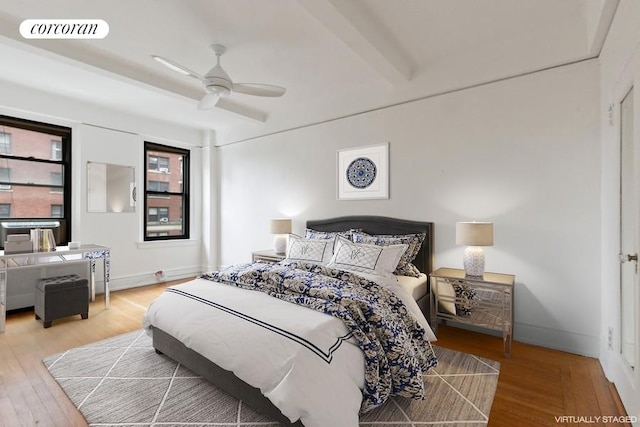 440 W End Ave Unit 5B, New York City, NY 10024 - bedroom featuring wood finished floors, baseboards, ceiling fan, and beamed ceiling
