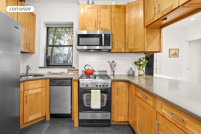 322 6th St Unit 5, New York City, NY 11215 - kitchen with stainless steel appliances, ornamental molding, a sink, backsplash, and brown cabinets