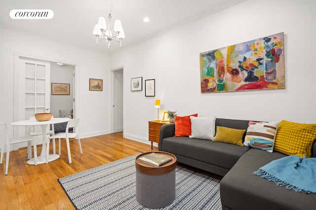 322 6th St Unit 5, New York City, NY 11215 - living room featuring a chandelier, light wood-type flooring, baseboards, and recessed lighting