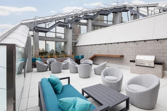 view of patio / terrace with outdoor dining space, a grill, an outdoor kitchen, and an outdoor living space