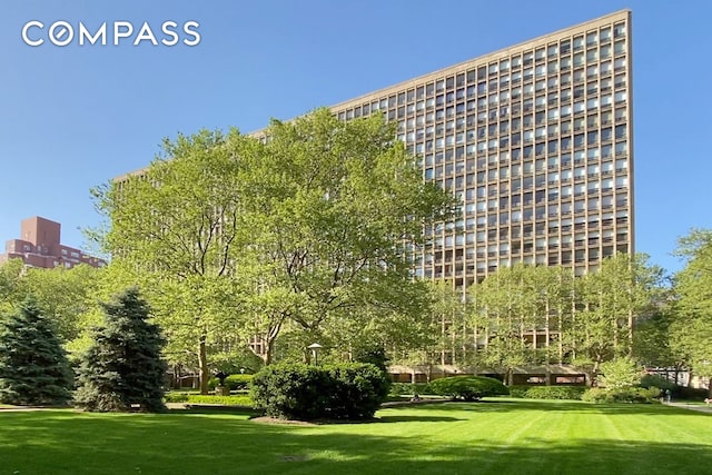 surrounding community with a lawn