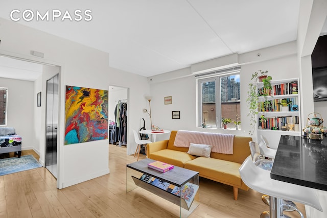 1810 3rd Ave Unit A7D, New York City, NY 10029 - living area featuring light wood-type flooring
