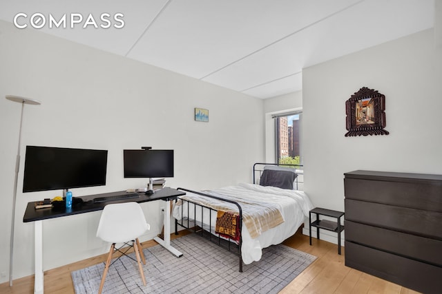 1810 3rd Ave Unit A7D, New York City, NY 10029 - bedroom featuring wood-type flooring and a desk