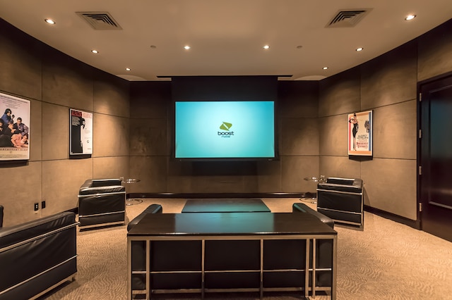 home theater featuring light colored carpet and recessed lighting