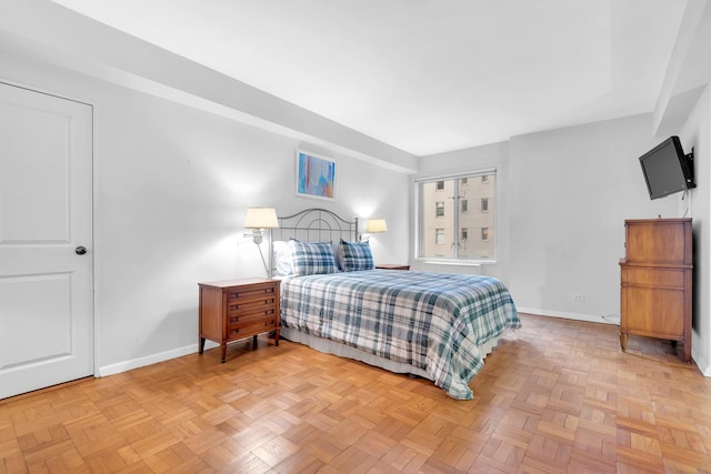 bedroom featuring baseboards