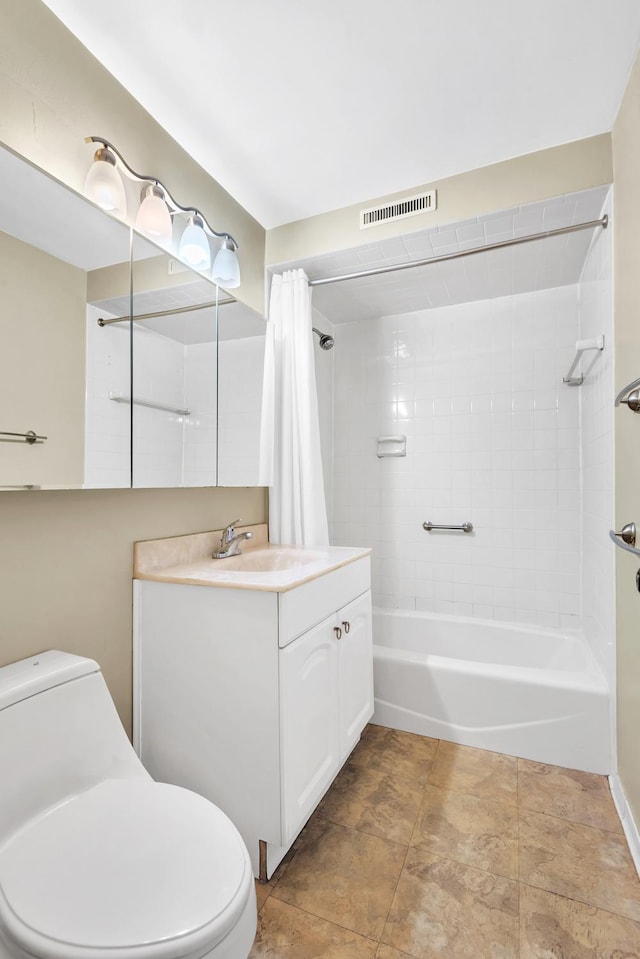 full bath featuring toilet, bathtub / shower combination, and vanity