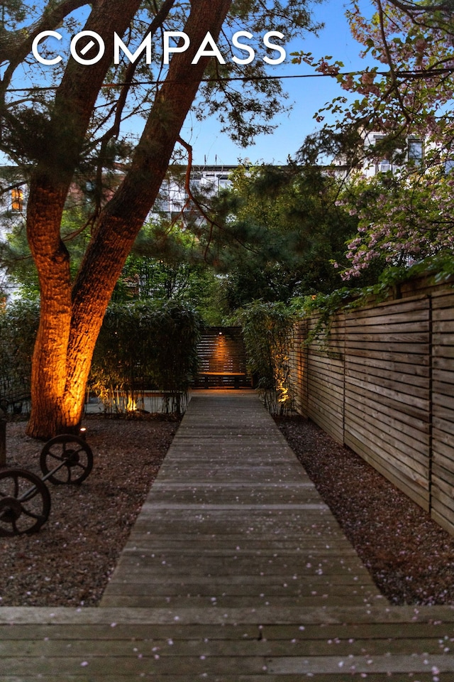 view of property's community with fence