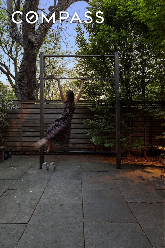 view of patio with fence
