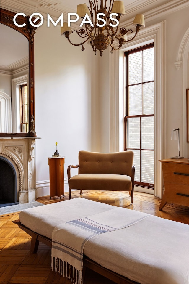 bedroom with crown molding, a chandelier, and arched walkways