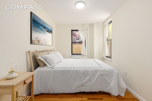 322 W 88th St Unit B, New York City, NY 10024 - bedroom featuring wood finished floors and baseboards