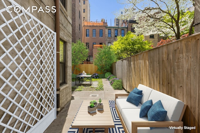 322 W 88th St Unit B, New York City, NY 10024 - view of patio featuring fence, outdoor lounge area, and outdoor dining area