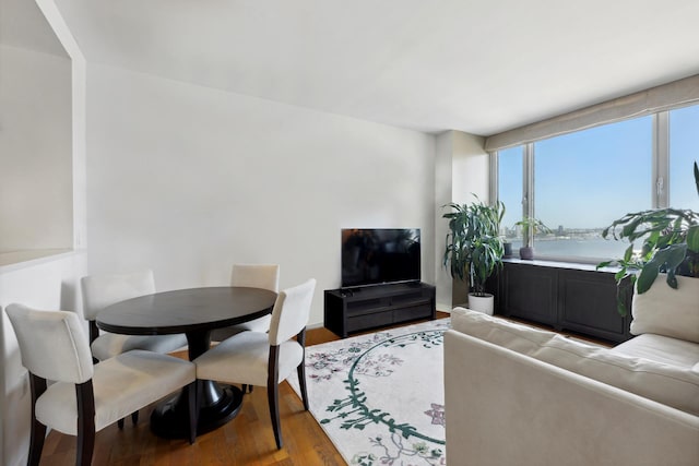 635 W 42nd St Unit 28D, New York City, NY 10036 - living area with wood finished floors