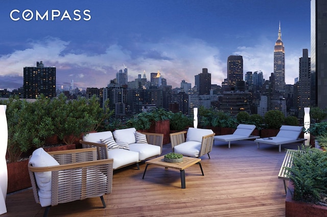 deck with outdoor lounge area and a view of skyline