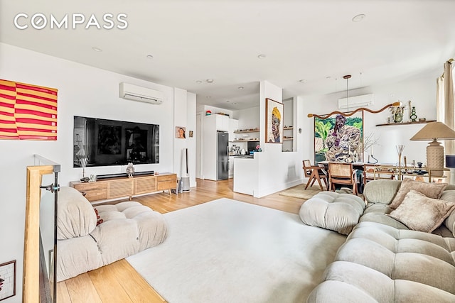 1404 Bushwick Ave Unit 1R, New York City, NY 11207 - living area with a wall mounted AC, light wood-style floors, recessed lighting, and baseboards