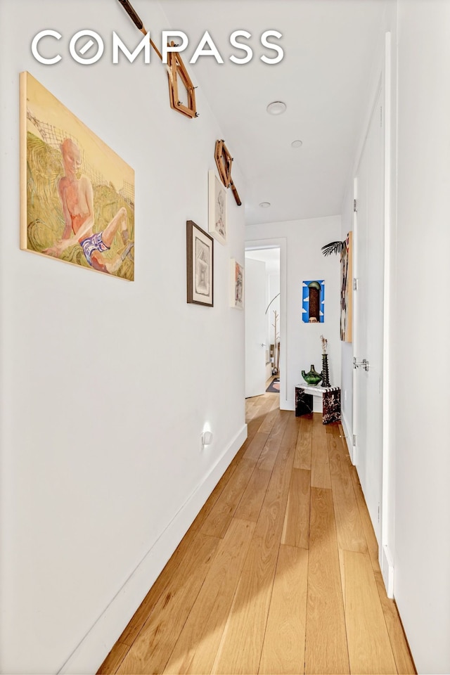 1404 Bushwick Ave Unit 1R, New York City, NY 11207 - hall featuring light wood finished floors and baseboards