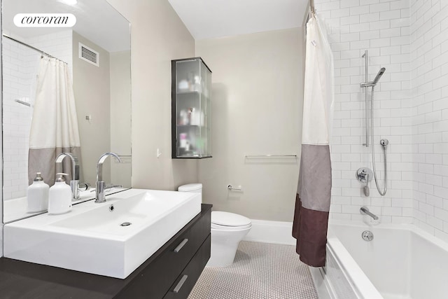 full bathroom with toilet, shower / bath combo, tile patterned floors, and vanity