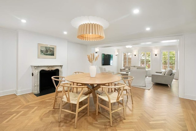 163 E 78th St, New York City, NY 10075 - dining space with a premium fireplace, ornamental molding, baseboards, and recessed lighting