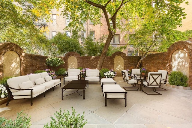 163 E 78th St, New York City, NY 10075 - view of patio with an outdoor living space and fence