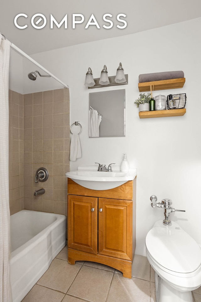bathroom with tile patterned floors, shower / bath combination with curtain, and vanity