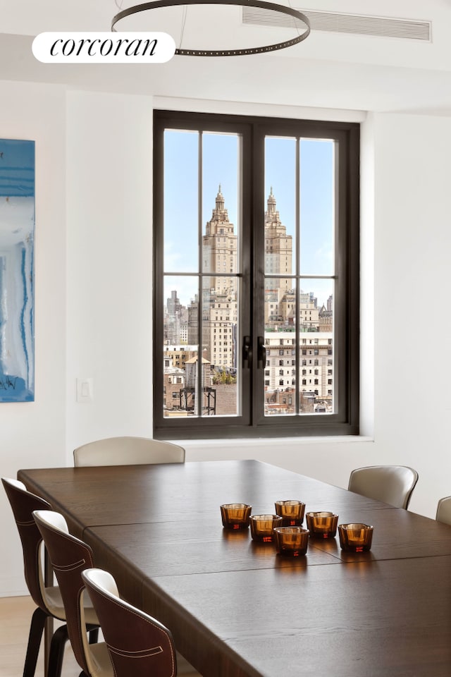 dining room with a view of city