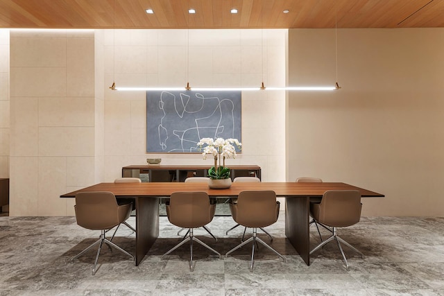 dining area with recessed lighting and wood ceiling