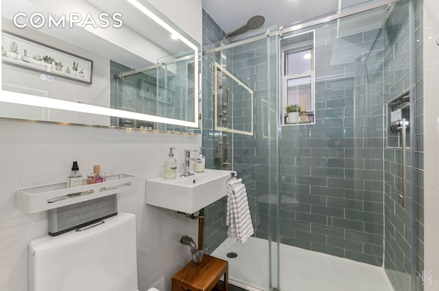33-44 93rd St Unit 5X, New York City, NY 11372 - full bathroom with a stall shower, toilet, and a sink