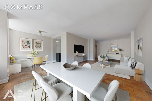 dining space with baseboards