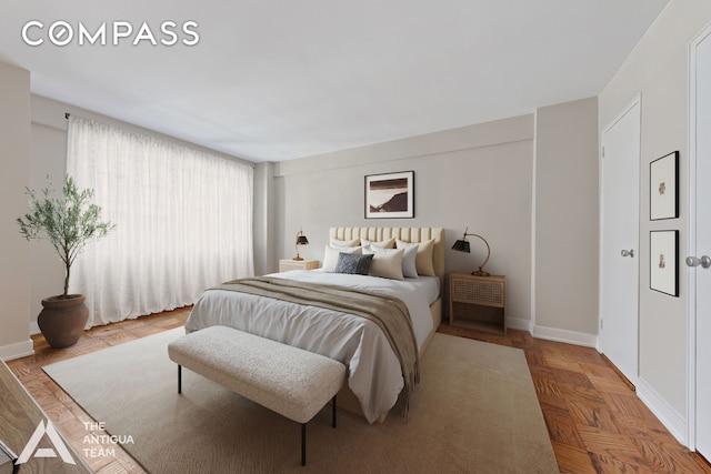 bedroom with baseboards