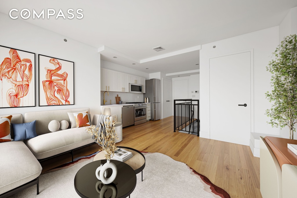 280 Nassau Ave Unit 1A, New York City, NY 11222 - living room featuring light wood-type flooring
