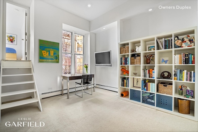 sitting room featuring carpet flooring and a baseboard radiator