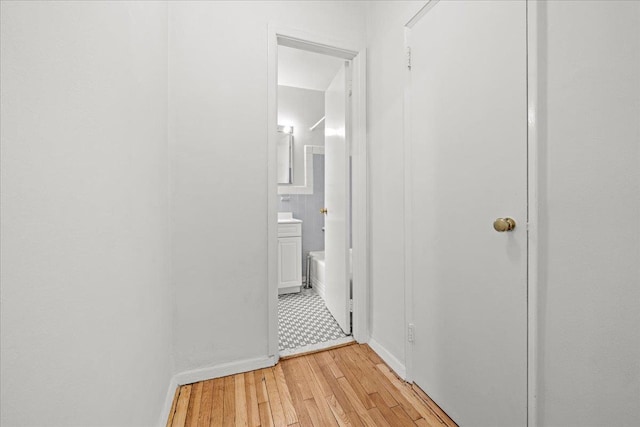 3601 Johnson Ave Unit 5K, New York City, NY 10463 - hallway featuring light wood-style flooring and baseboards