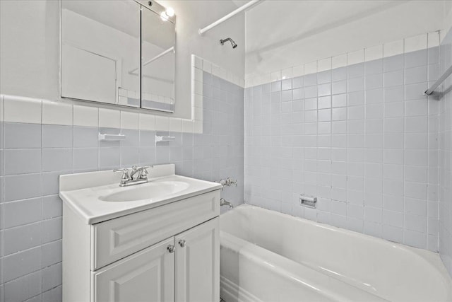 3601 Johnson Ave Unit 5K, New York City, NY 10463 - full bathroom featuring vanity, bathtub / shower combination, and tile walls