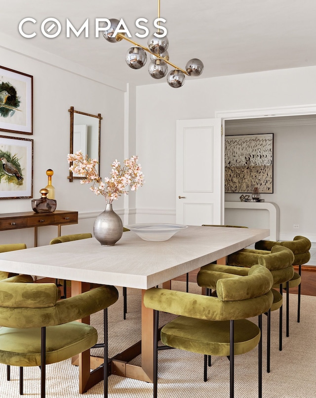 dining area featuring a chandelier