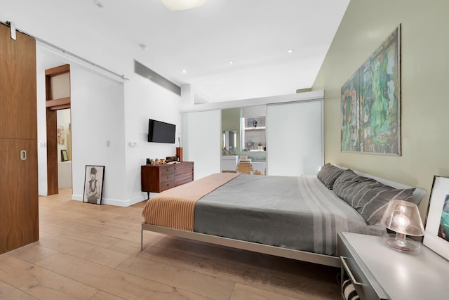 131 5th Ave Unit 601, New York City, NY 10011 - bedroom with light wood-style floors and recessed lighting