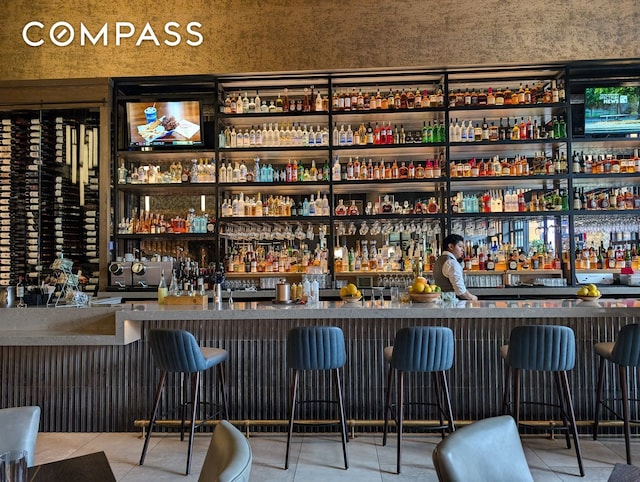 community bar area with tile patterned floors