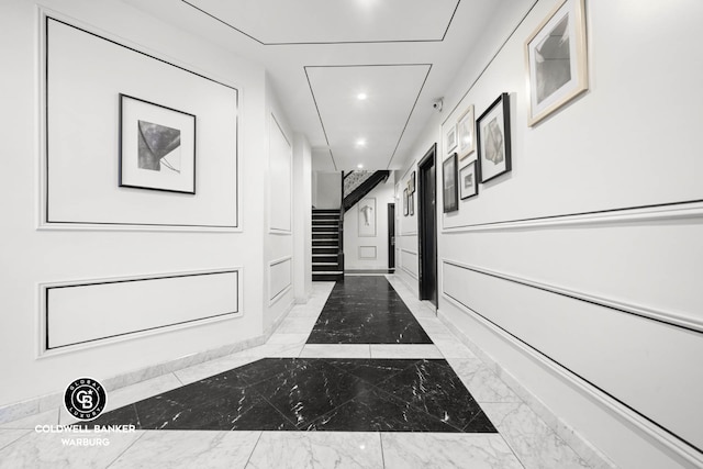 65 W 107th St Unit 4D, New York City, NY 10025 - hallway featuring marble tiled flooring, recessed lighting, and stairway
