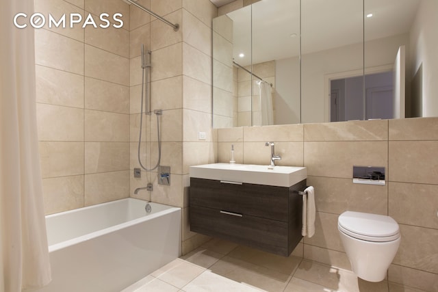 101 Leonard St Unit 4A, New York City, NY 10013 - bathroom with tile walls, shower / bath combination with curtain, tile patterned floors, vanity, and toilet
