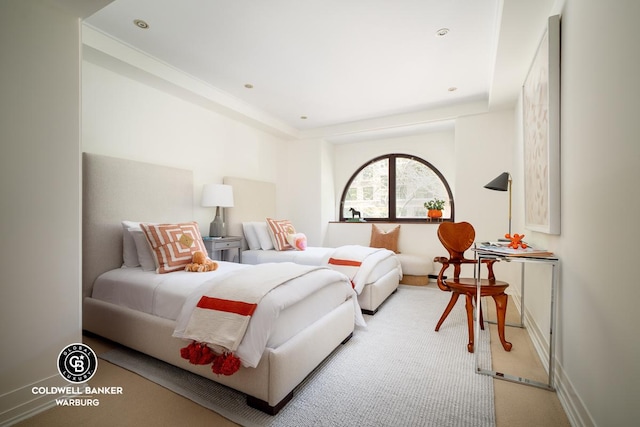 bedroom with carpet floors and baseboards
