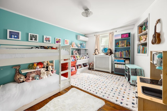 275 Degraw St Unit A, New York City, NY 11231 - bedroom featuring radiator, wood finished floors, ornamental molding, and a wall unit AC