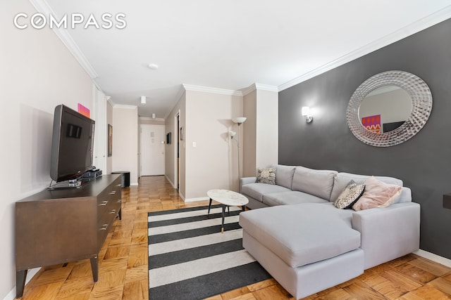 living room with crown molding and baseboards